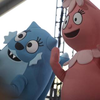 Pink and Blue Cartoon Mascot