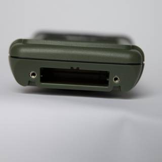 Green Device on White Surface