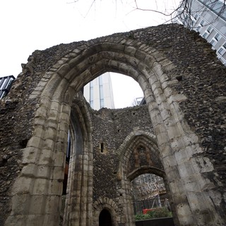 Ancient Church Ruins Framed by Modern Architecture