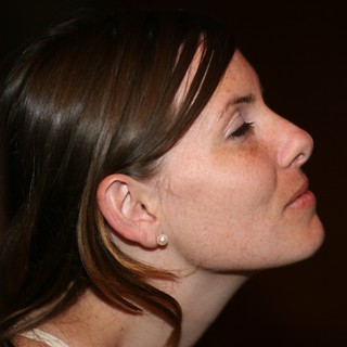 Elegant Profile Portrait of a Woman in Repose