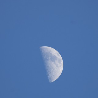 Waxing Gibbous Moon in Clear Blue Sky