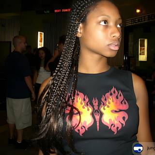 Young Woman with Braids in Black Shirt