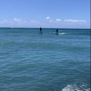 Surfing Duo Enjoying the Waikiki Waves