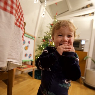 Toddler's Joyful Christmas Morning in Kitchen