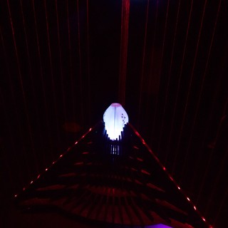 Illuminated Skull Installation with Red Laser Light Patterns