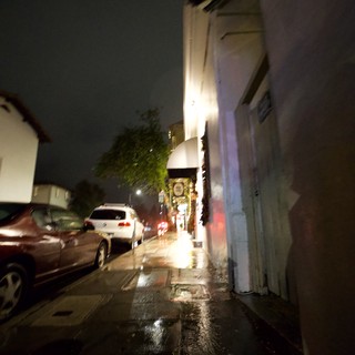 Rainy Night on a Narrow Urban Street