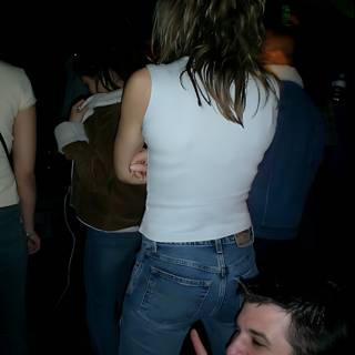 White Shirt and Jeans in a Nightclub Crowd