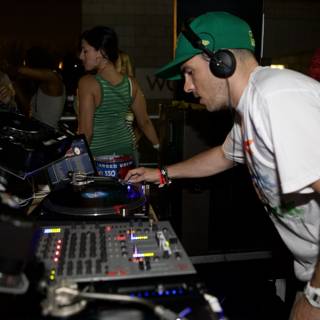 Green-Clothed DJ at Nightclub