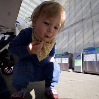 Curious Toddler Exploring Train Station Platform