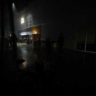 Full Haus Sign Glows Over Dark Concert Venue Floor