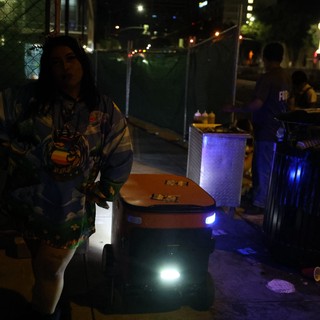 Autonomous Delivery Robot Navigates Nighttime Festival Sidewalk