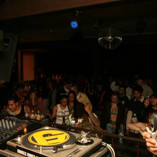 DJ spinning tunes at a lively nightclub