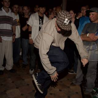 Man in a Stylish Hat Shows Off his Break Dancing Skills