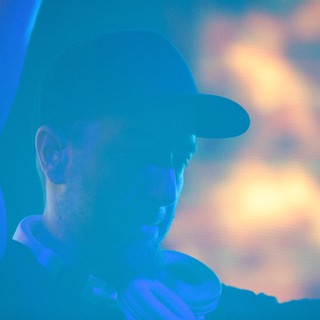 DJ Silhouette Bathed in Blue at Wobbleland 2026