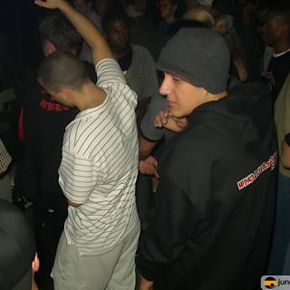 Nightclub crowd wearing hats and beanies