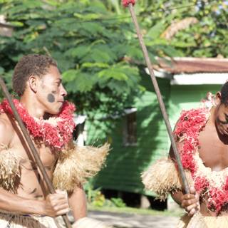 Spear-Wielding Traditional Dancers