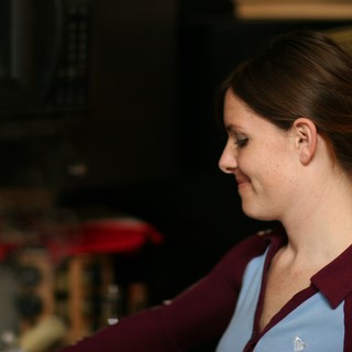 Candid Profile Portrait of Smiling Young Woman