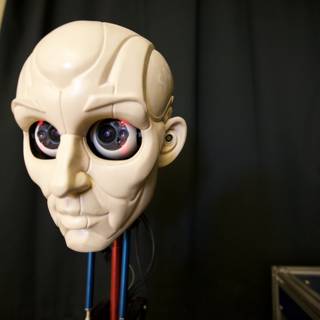Robot Head Figurine with Alien-Like Features