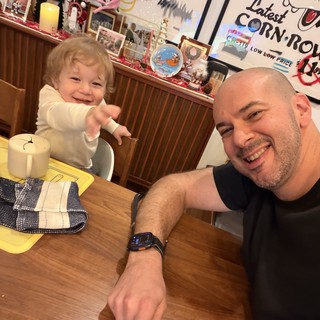 Father and Toddler Sharing Mealtime at Home