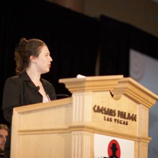Woman Giving Impactful Speech at Podium