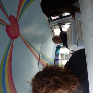 Colorful Van Interior with Rainbow Ceiling Decoration