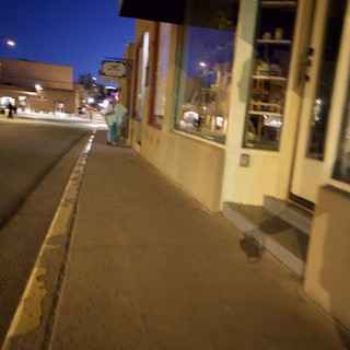 Evening Stroll Along Santa Fe Sidewalk at Dusk