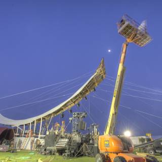Crane lifting giant tent at Coachella