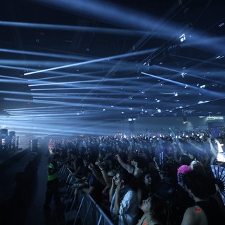 Massive Crowd Erupts Under Laser Light Storm