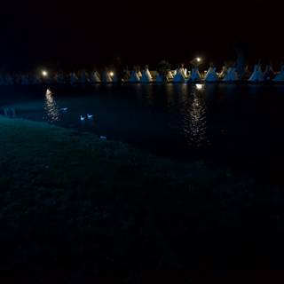 Illuminated Night Scene by the Lake