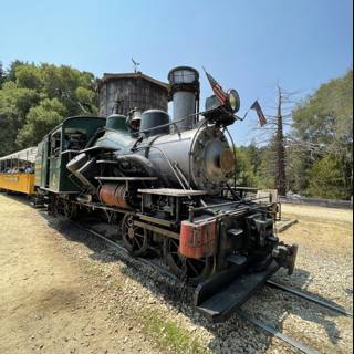 Vintage Locomotive on Railroad Tracks