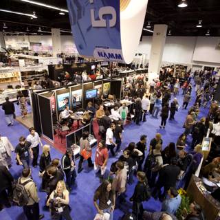 Virgil Donati Surrounded by Enthusiastic Crowd at NAMM Trade Show