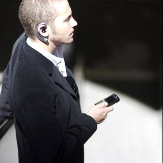Businessman on the Phone Caption: A suited man stays connected with his cell phone during a business shoot for Flexilis.