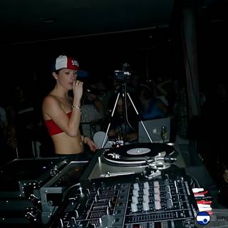 The Red-Hatted DJ