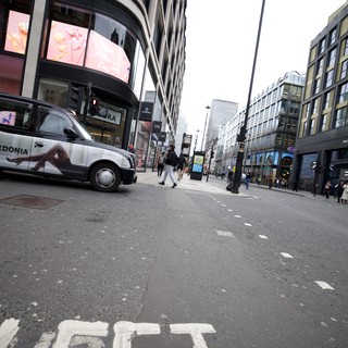 Urban Street View with 'LEFT' Road Marking in London