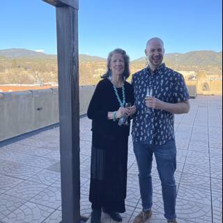 A Portrait of Two People Standing on a Patio in Santa Fe