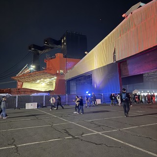 Industrial Warehouse Event at Night with Colorful Lighting