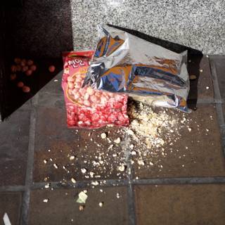 Littered Snacks on Downtown Walkway