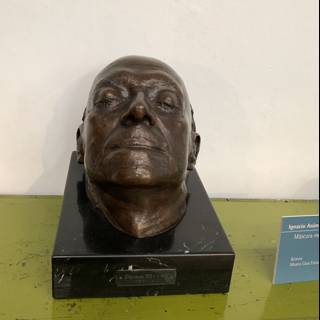 Man's Bronze Sculpture on Display