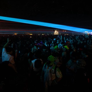 Laser Light Show Illuminates Massive Festival Crowd