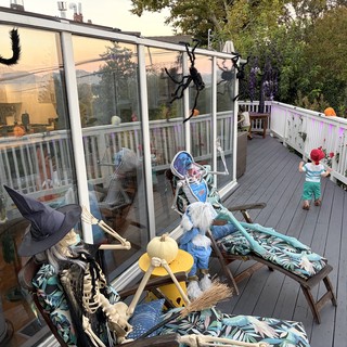 Halloween-Decorated Sunroom Porch with Spooky Decorations