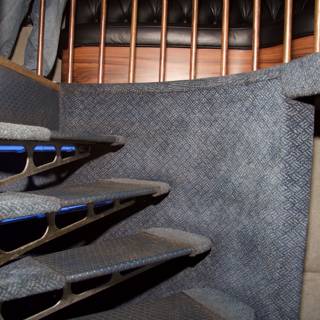 Inside a Blue Bus with a Staircase