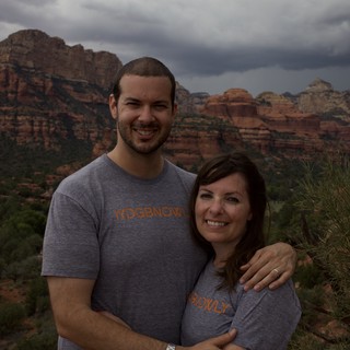 Couple Smiling Against Sedona Red Rock Backdrop
