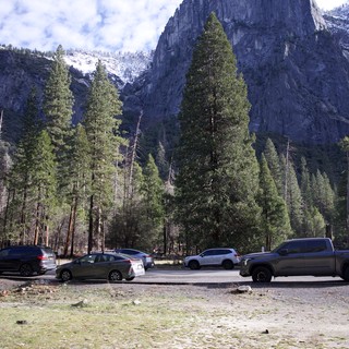 Yosemite Valley Parking Beneath Snow-Capped Granite Cliffs