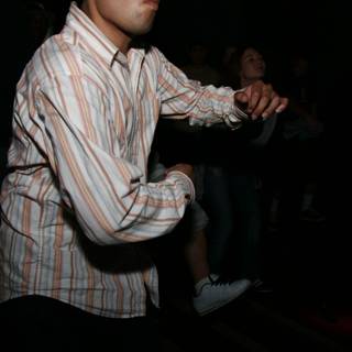 Striped Shirted Man on the Dancefloor