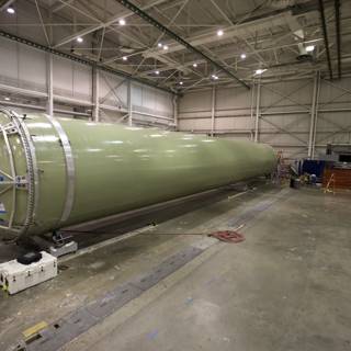 The Massive Green Cylinder in the Warehouse