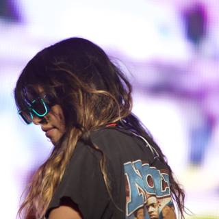 Woman with Long Hair and Sunglasses on Stage