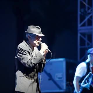 Leonard Cohen Rocks Coachella in Classic Fedora and Suit