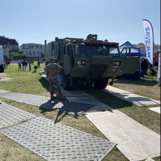 Military Vehicle Parked on Grass