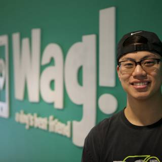 Ning Zetao Poses in Front of WAG Logo
