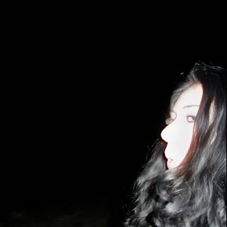 Nighttime Portrait of a Woman with Long Black Hair